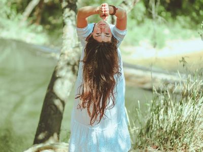 A person's hands in a meditative mudra position.
